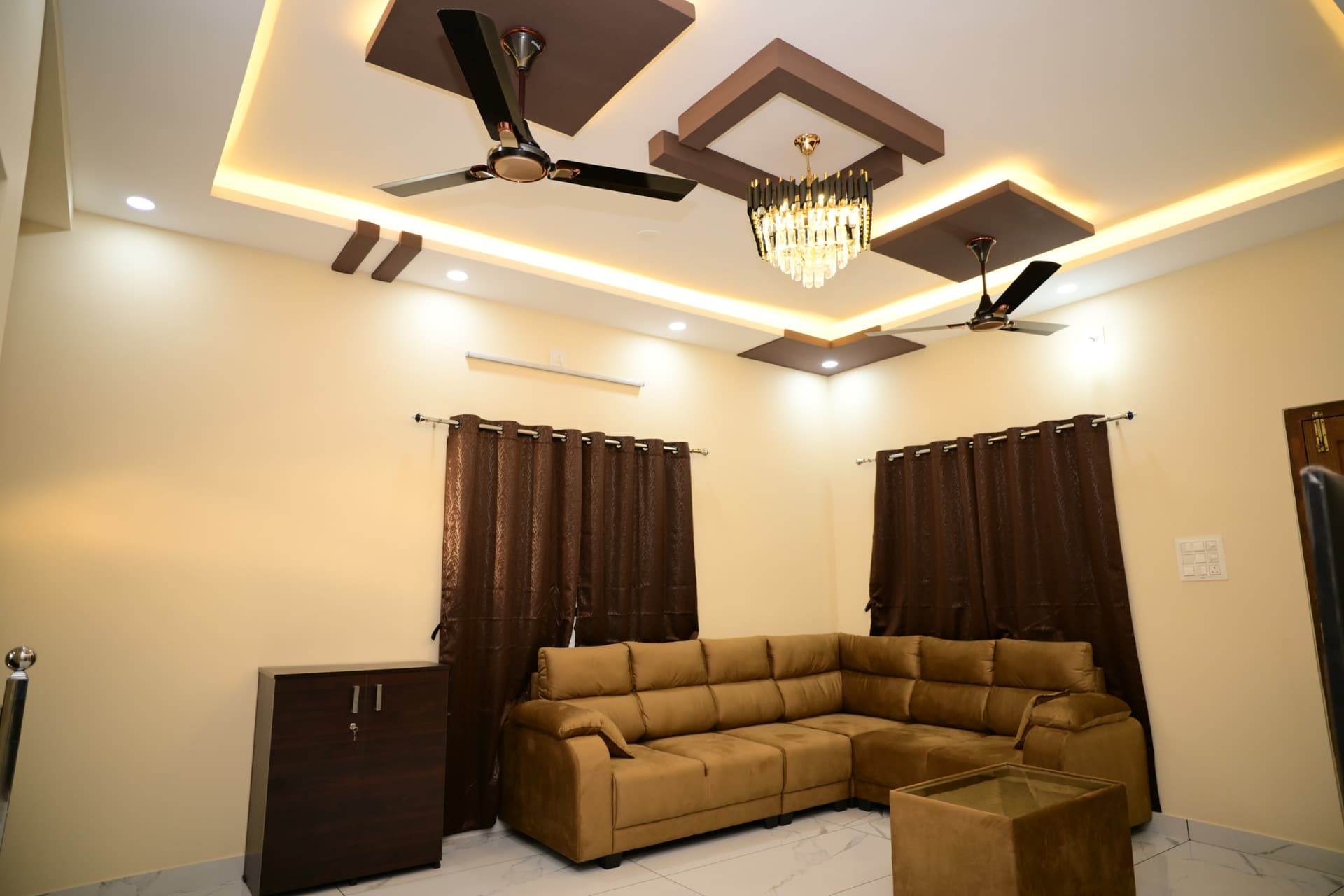 Hallway drenched in natural light with relaxed seating.