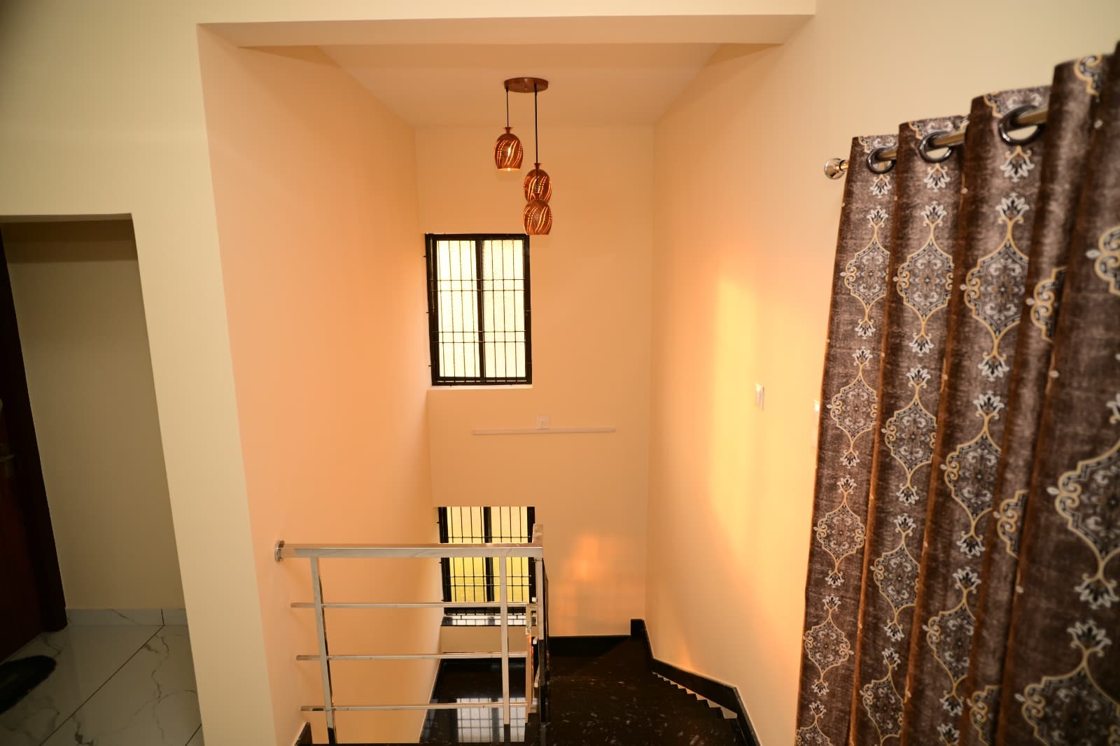 Extended hall for gatherings and movie nights.